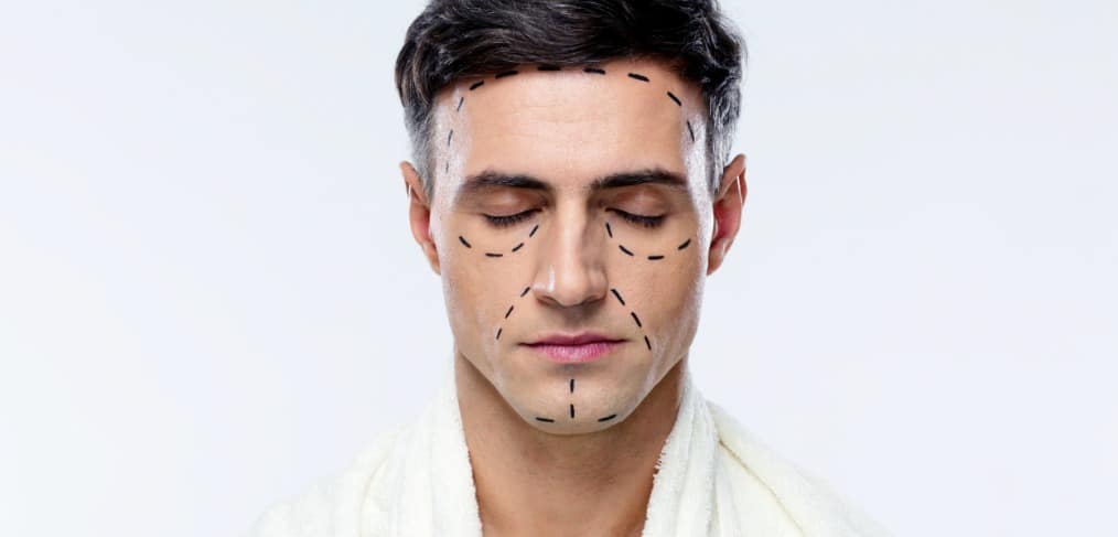 a man with dotted lines on his face