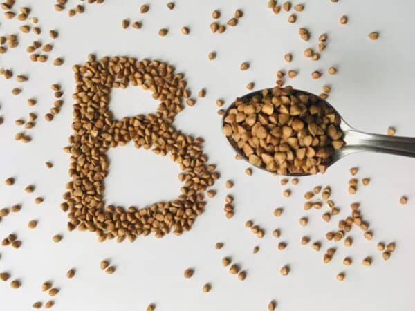 Buckwheat on white background showing B